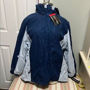 NEW ZeroXposur Blue Ski Jacket with High Collar and Water-Resistant Shell